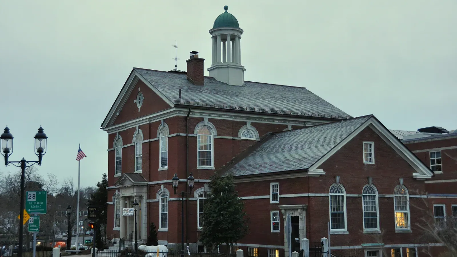 Memorial Hall Library, a red-brick building with a green copper cupola, Andover, Massachusetts